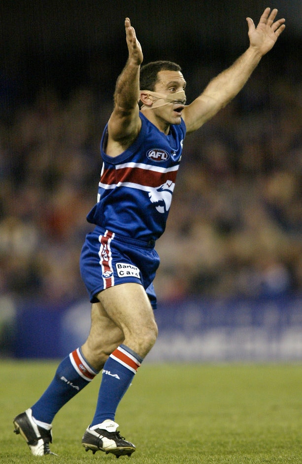 AFL 2002 Rd 17 - Western Bulldogs v Kangaroos Tony Liberatore of the Bulldogs leads for the ball during the round 17 AFL match between the Western Bulldogs and the Kangaroos at the Colonial Stadium in Melbourne, Australia on July 28, 2002.